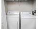 White washer and dryer are ready for laundry in the laundry closet at 206 E South St # 4031, Orlando, FL 32801