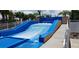 Solara Resort's FlowRider, a continuous wave machine for surfing and bodyboarding with resort logo visible at 2182 Cooper Bell Pl, Kissimmee, FL 34747