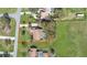 Aerial view highlighting property lines for a home with a private pool and well maintained landscaping at 2825 Lake Tohopekaliga Blvd, Kissimmee, FL 34746