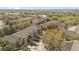 Aerial view of townhome community with mature trees and landscaping at 2851 Polvadero Ln # 107, Orlando, FL 32835