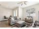 Comfortable living room with plush seating and natural light at 3167 Crown Jewel Ct, Winter Park, FL 32792