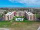 Aerial view of the condo complex with a pool and great views of the city at 325 Wilder Blvd # A404, Daytona Beach, FL 32114