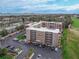 Beautiful aerial view of the condo complex with ample parking and well-maintained landscaping at 325 Wilder Blvd # A404, Daytona Beach, FL 32114