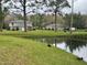 Lush backyard featuring a pond with ducks in a beautiful backyard at 4154 Pinebark Ave # 3, Orlando, FL 32811