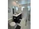 Bathroom featuring double sinks, modern fixtures, and luxurious finishes at 695 Whistling Straits Blvd, Davenport, FL 33896