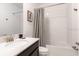 Bathroom with tub and shower combination, neutral vanity, and modern fixtures at 695 Whistling Straits Blvd, Davenport, FL 33896