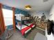 Charming bedroom with a bunk bed and fun, themed decor for a playful atmosphere at 695 Whistling Straits Blvd, Davenport, FL 33896