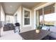 Outdoor patio featuring a dining area and seating area with overhead shade at 695 Whistling Straits Blvd, Davenport, FL 33896