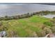 Wide open recreation field for sports and activities with a scenic lake view at 719 Postrio Way, Ocoee, FL 34761