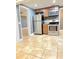 Kitchen featuring stainless steel appliances, granite countertops and tile flooring at 722 Eagle Ave, Longwood, FL 32750