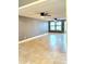 Bright living room featuring neutral colors, tile floor, and a ceiling fan at 722 Eagle Ave, Longwood, FL 32750