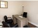 Home office with a modern desk, a lamp, and three chairs at 8010 Tuscany Way # 5206, Davenport, FL 33896