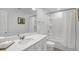 Well-lit bathroom with white vanity, tub/shower, and contemporary fixtures at 8903 Caroline Bay Ct, Kissimmee, FL 34747