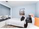 Stylized twin bedroom with beach decor and window nook, a comfortable and inviting space at 905 Bella Vista Way, Orlando, FL 32825