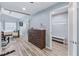 A cozy bedroom with wood-look floors and a decorative wooden dresser at 905 Bella Vista Way, Orlando, FL 32825