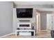 Cozy living room featuring a fireplace with a modern white mantle at 905 Bella Vista Way, Orlando, FL 32825