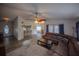 Inviting living room with seamless flow to kitchen and dining area, featuring an open-concept design at 1002 Royalton Rd, Orlando, FL 32825