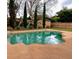 Backyard with a pool, a playset, and a storage shed at 1002 Royalton Rd, Orlando, FL 32825