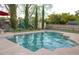 A private backyard swimming pool featuring a nearby playground and a wooden storage shed at 1002 Royalton Rd, Orlando, FL 32825