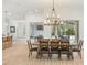 Dining room with modern light fixtures, a large table, and stylish chairs at 10361 Mallard Landings Way, Orlando, FL 32832