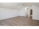 This bright bedroom boasts recessed lighting, a ceiling fan, and an ensuite bathroom at 11237 Camden Park Dr, Windermere, FL 34786