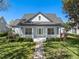 Charming one-story home with a well-manicured lawn and inviting front porch, perfect for relaxing at 11237 Camden Park Dr, Windermere, FL 34786