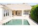 Relaxing backyard oasis with a private pool, patio, and outdoor kitchen for luxurious outdoor living at 11474 Claymont Cir, Windermere, FL 34786