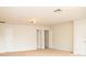 Spacious room boasting neutral carpet and walls with multiple doors and ample closet space at 11474 Claymont Cir, Windermere, FL 34786
