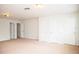 Expansive bonus room with multiple doors and neutral carpet creating a flexible living space at 11474 Claymont Cir, Windermere, FL 34786