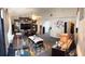 Wide-angle view of a spacious living room, featuring a large TV, comfortable seating, and ample natural light at 1318 Daniels Cove Dr, Winter Garden, FL 34787