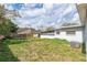 This spacious backyard includes room to relax and play at 1408 N Pine Hills Rd, Orlando, FL 32808