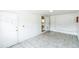 This mud room offers access to the kitchen, and a secure door to the backyard at 1408 N Pine Hills Rd, Orlando, FL 32808