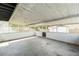 A screened-in patio with a concrete floor and a covered ceiling at 1408 N Pine Hills Rd, Orlando, FL 32808