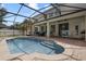 Stunning screened pool with spacious patio and outdoor seating area; perfect for entertaining and relaxation at 15143 Ovation Dr, Winter Garden, FL 34787