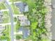 Aerial view of a residential neighborhood and home backing to the St Johns River at 210 Torcaso Ct, Winter Springs, FL 32708