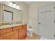 Bathroom featuring a marble vanity, ample storage, and neutral tones, exuding elegance and functionality at 210 Torcaso Ct, Winter Springs, FL 32708