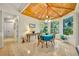 Charming breakfast nook featuring a wood ceiling and large windows overlooking the garden at 210 Torcaso Ct, Winter Springs, FL 32708