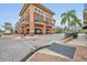 Attractive commercial building exterior with brick accents, balconies, and convenient shopping nearby at 210 Torcaso Ct, Winter Springs, FL 32708
