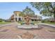 A decorative fountain in a well-maintained commercial plaza with pedestrian access at 210 Torcaso Ct, Winter Springs, FL 32708