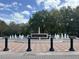 Beautiful Magnolia Square fountain surrounded by lush greenery and trees, creating a serene atmosphere at 210 Torcaso Ct, Winter Springs, FL 32708