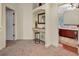 Upstairs hallway with built-in desk and chair, next to the main bedroom at 210 Torcaso Ct, Winter Springs, FL 32708