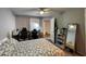 Bedroom featuring neutral colored walls, ceiling fan, and closet at 2200 Metropolitan Way # 926, Orlando, FL 32839