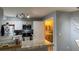 Bright, modern kitchen featuring granite countertops, stainless steel appliances, and a stylish breakfast bar at 2200 Metropolitan Way # 926, Orlando, FL 32839