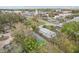 Property aerial showing the house among tree lined street at 2206 W Pine St, Orlando, FL 32805