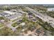 Aerial panorama of homes near a highway and commercial buildings, showing the blend of residential and business sectors at 2206 W Pine St, Orlando, FL 32805