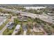 A bird's eye view captures homes adjacent to a busy highway, highlighting the area's connection to key transport routes at 2206 W Pine St, Orlando, FL 32805