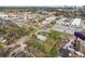 An aerial view of a modest home in a mixed residential and commercial neighborhood at 2206 W Pine St, Orlando, FL 32805