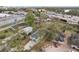 Aerial view showcases homes near a highway overpass surrounded by lush greenery with convenient urban access at 2206 W Pine St, Orlando, FL 32805