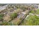 Aerial view displays cozy houses nestled in verdant surroundings, close to urban amenities and thoroughfares at 2206 W Pine St, Orlando, FL 32805