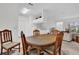 Cozy dining area with a view into the living room and kitchen at 2314 Arbor Lakes Cir # 1, Sanford, FL 32771